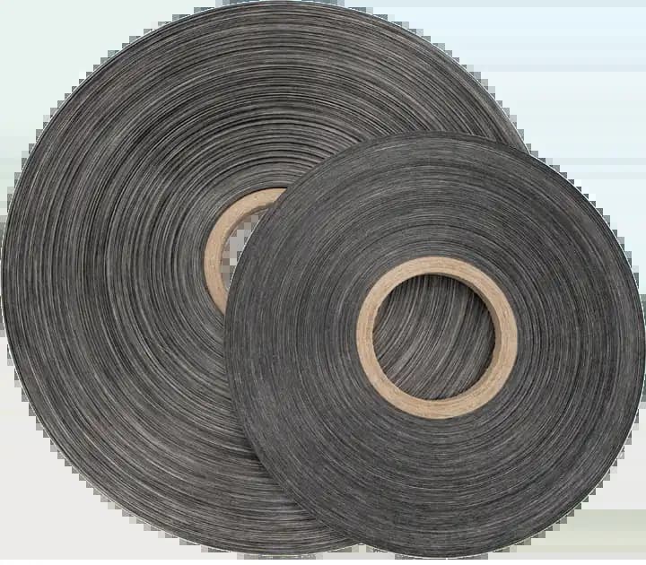 UD-Tape spools made from fiber-reinforced thermoplastics.
