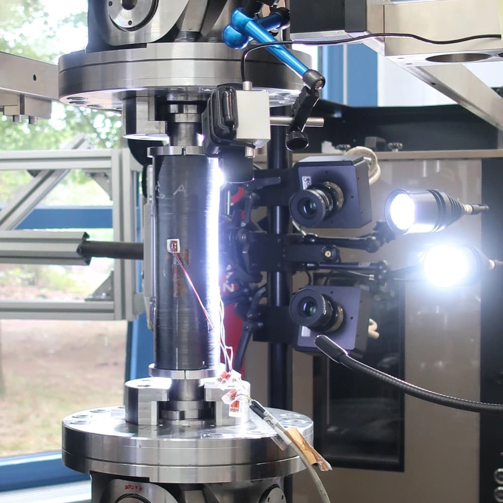 Biaxial test specimen for testing fiber-reinforced composites